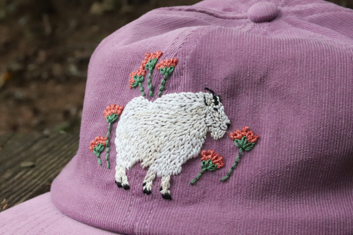 Somewhere in the Rockies: Mountain Goat and Paintbrush